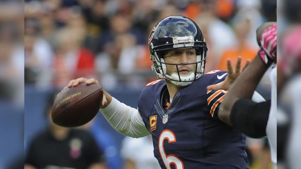 Oct 6, 2013; Chicago, IL, USA; Chicago Bears quarterback Jay Cutler (6) throws against the New Orleans Saints during the second of their game at Soldier Field.