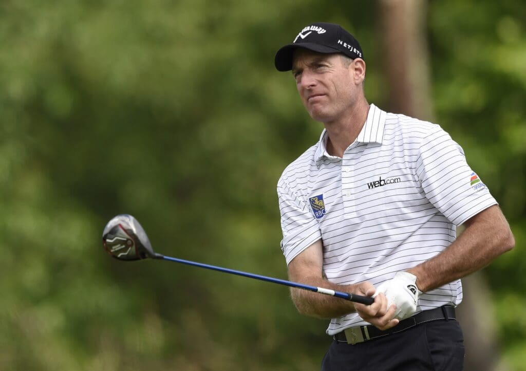 Jun 17, 2016; Oakmont, PA, USA; Jim Furyk hits his tee shot on the 4th hole during the continuation of the first round of the U.S. Open golf tournament at Oakmont Country Club.