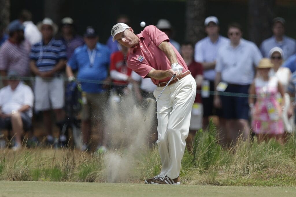 Jun 14, 2014; Pinehurst, NC, USA; Jim Furyk hits a shot on the 7th hole during the third round of the 2014 U.S. Open golf tournament at Pinehurst Resort Country Club - #2 Course.