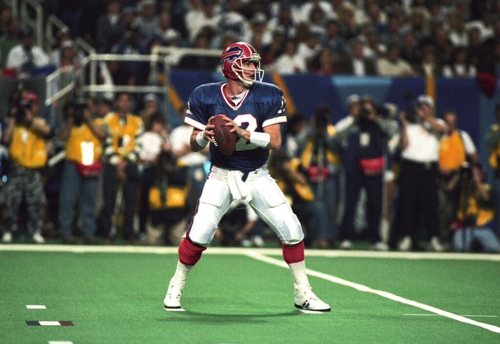 Jan 30, 1994; Atlanta, GA, USA; FILE PHOTO; Buffalo Bills quarterback Jim Kelly (12) looks to throw against the Dallas Cowboys during Super Bowl XXVIII at the Georgia Dome. Dallas defeated Buffalo 30-13.