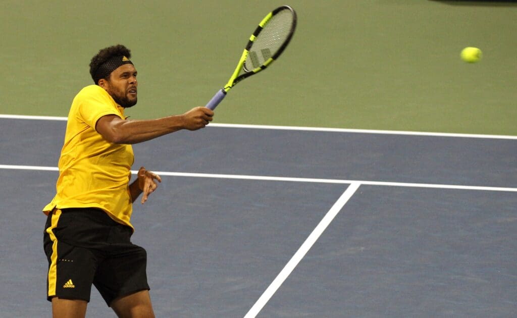 Aug 9, 2017; Montreal, Quebec, Canada; Jo-Wilfried Tsonga of France hits a shot against Sam Querrey of United States (not pictured) during the Rogers Cup tennis tournament at Uniprix Stadium