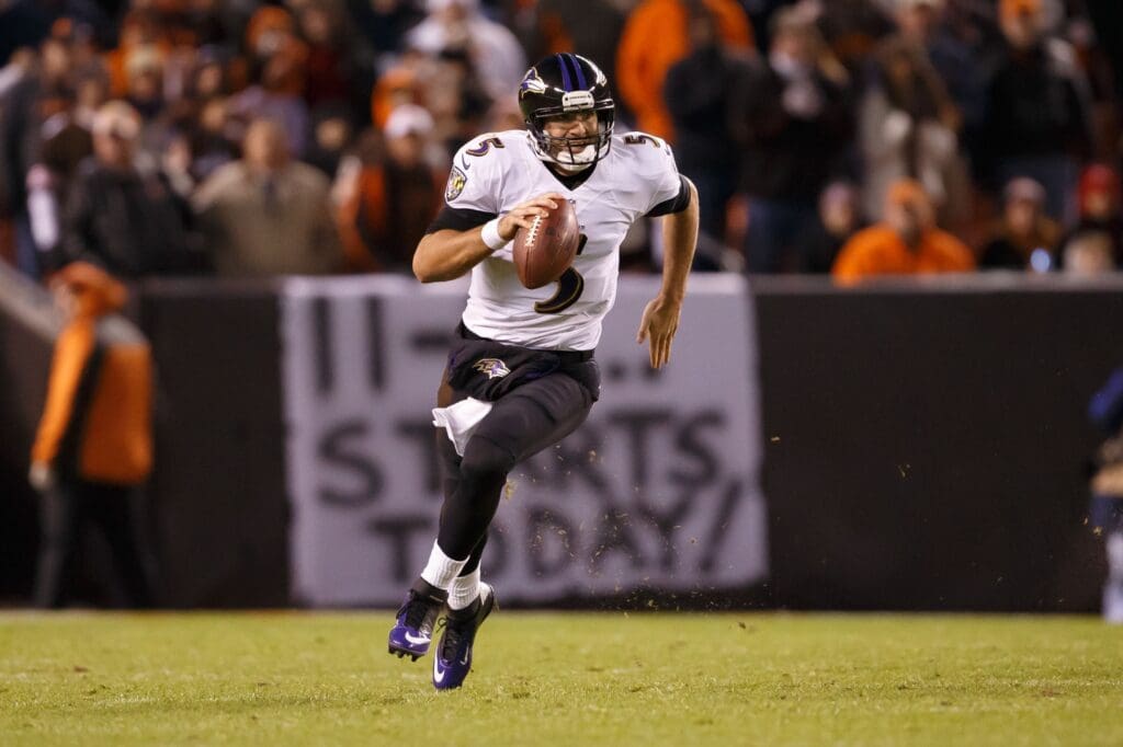 Nov 3, 2013; Cleveland, OH, USA; Baltimore Ravens quarterback Joe Flacco (5) runs the ball against the Cleveland Browns at FirstEnergy Stadium.