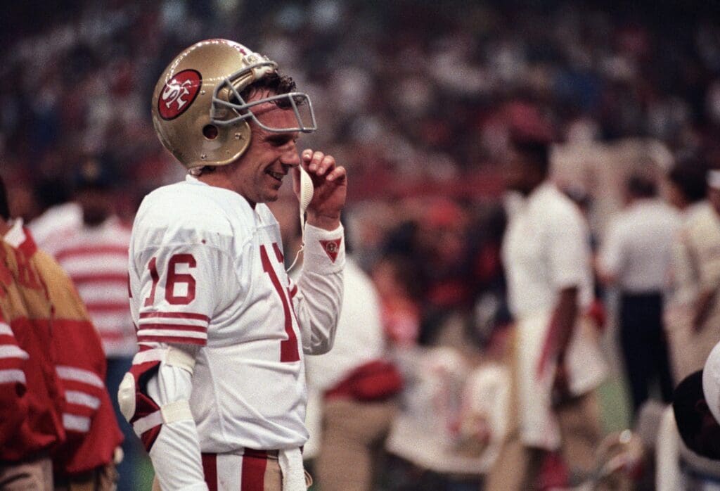 Jan 28, 1990; New Orleans, LA, USA; FILE PHOTO; San Francisco 49ers quarterback Joe Montana (16) on the sidelines against the Denver Broncos during Super Bowl XXIV at the Superdome. The 49ers defeated the Broncos 55-10.