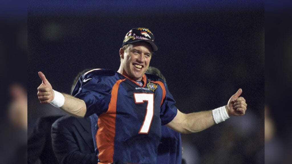 Jan 25, 1998; San Diego, CA, USA; FILE PHOTO; Denver Broncos quarterback John Elway (7) celebrates the victory over the Green Bay Packers in Super Bowl XXXII at Qualcomm Stadium. The Broncos defeated the Packers 31-24.