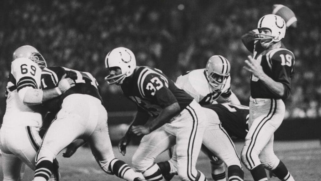 Oct 14, 1962; Cleveland, OH, USA; FILE PHOTO: Baltimore Colts Hall of Fame quarterback (19) JOHNNY UNITAS throws a pass against the Cleveland Browns at Cleveland Stadium. The Colts won the game 36-14.