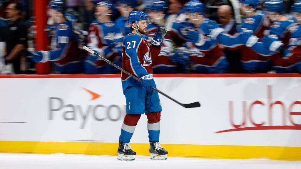 Mar 27, 2025; Denver, Colorado, USA; Colorado Avalanche left wing Jonathan Drouin (27) celebrates with the bench after his goal in the third period against the Los Angeles Kings at Ball Arena.