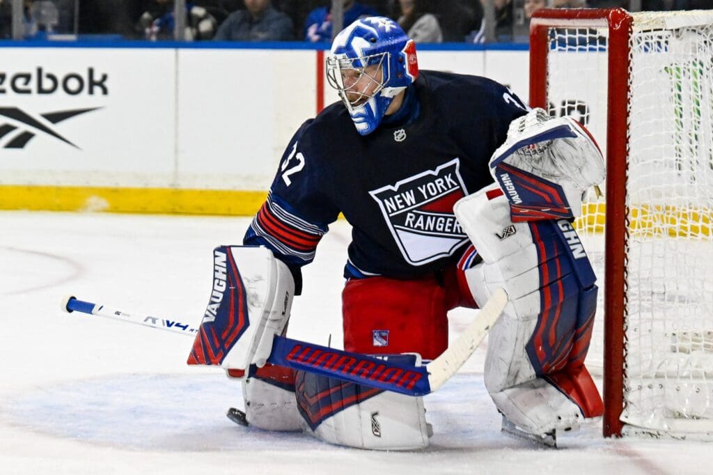Apr 9, 2025; New York, New York, USA; New York Rangers goaltender Jonathan Quick (32) makes a save against the Philadelphia Flyers during the third period at Madison Square Garden.