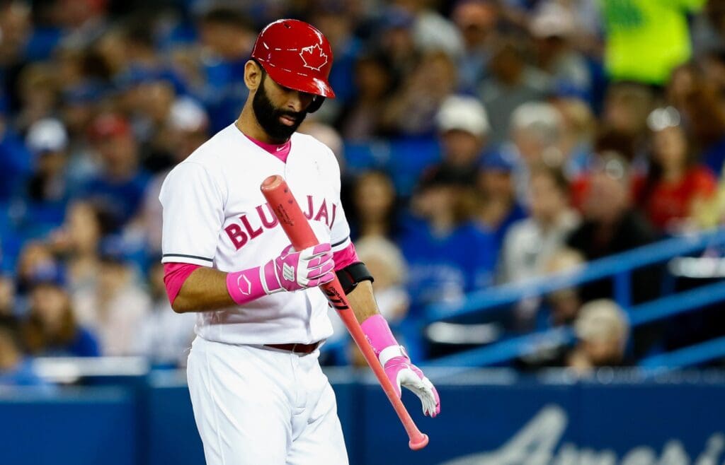 May 14, 2017; Toronto, Ontario, CAN; Toronto Blue Jays right fielder Jose Bautista (19) examines his bat during an MLB game against the Seattle Mariners at Rogers Centre.