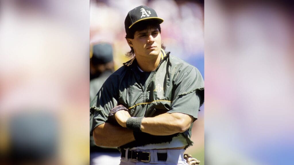 May 6, 1991; Cleveland, OH, USA; FILE PHOTO; Oakland Athletics outfielder Jose Canseco during batting practice against the Cleveland Indians at Cleveland Stadium.