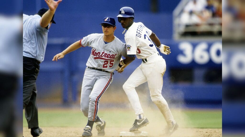 Jul 7, 1992, USA; FILE PHOTO; Montreal Expos infielder Bret Barberie (25) tags Los Angeles Dodgers base runner Jose Offerman (30) as Offerman slides into 2nd base safely at Dodger Stadium.