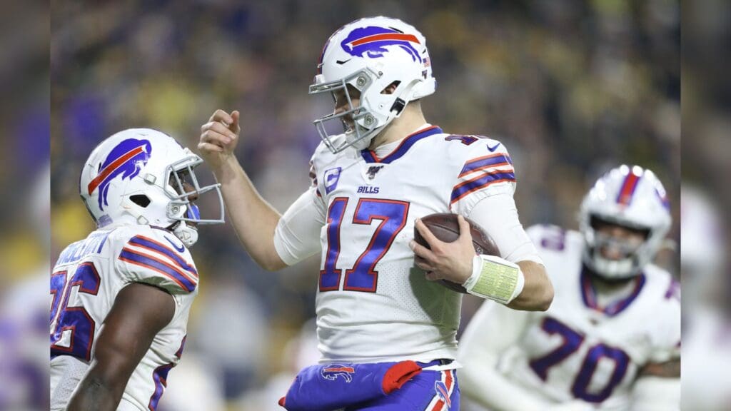 Dec 15, 2019; Pittsburgh, PA, USA; Buffalo Bills quarterback Josh Allen (17) celebrates his touchdown with running back Devin Singletary (26) against the Pittsburgh Steelers during the second quarter at Heinz Field.