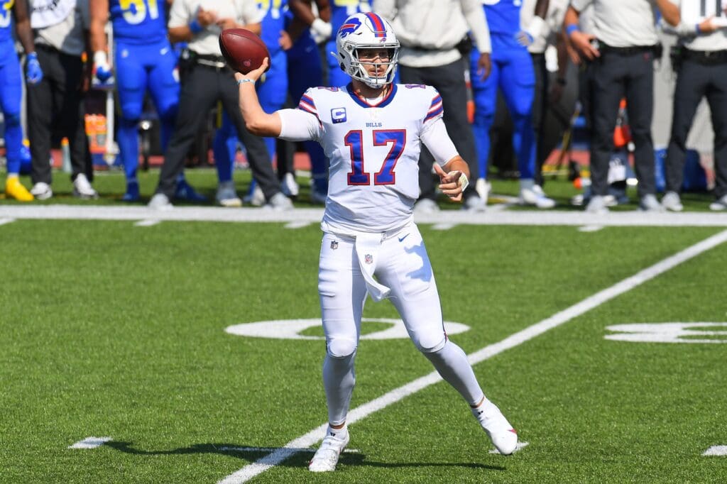 Sep 27, 2020; Orchard Park, New York, USA; Buffalo Bills quarterback Josh Allen (17) passes the ball against the Los Angeles Rams during the first quarter at Bills Stadium.