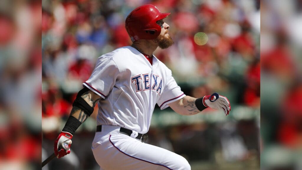 Oct 3, 2015; Arlington, TX, USA; Texas Rangers left fielder Josh Hamilton (32) follows through on his solo home run against the Los Angeles Angels during the second inning of a baseball game at Globe Life Park in Arlington.