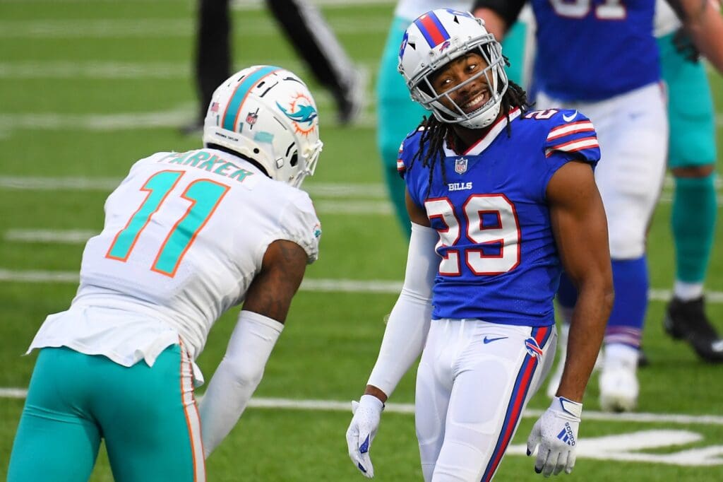 Jan 3, 2021; Orchard Park, New York, USA; Buffalo Bills cornerback Josh Norman (29) reacts in the direction of Miami Dolphins wide receiver DeVante Parker (11) following a defensive play during the third quarter at Bills Stadium.