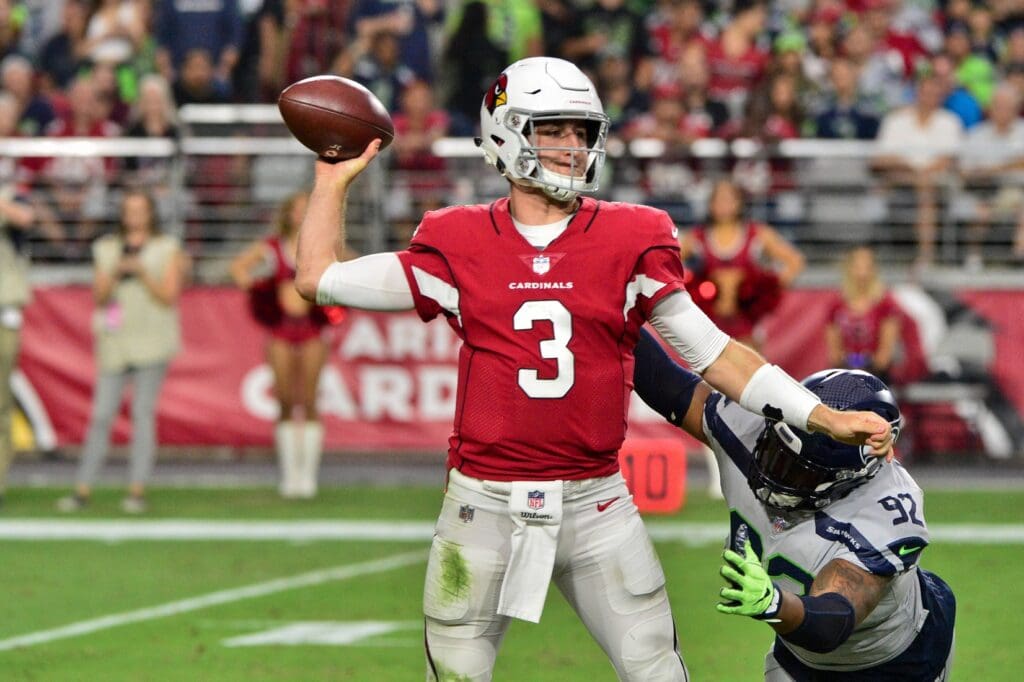 Sep 30, 2018; Glendale, AZ, USA; Arizona Cardinals quarterback Josh Rosen (3) throws under pressure from Seattle Seahawks defensive tackle Nazair Jones (92) during the second half at State Farm Stadium.