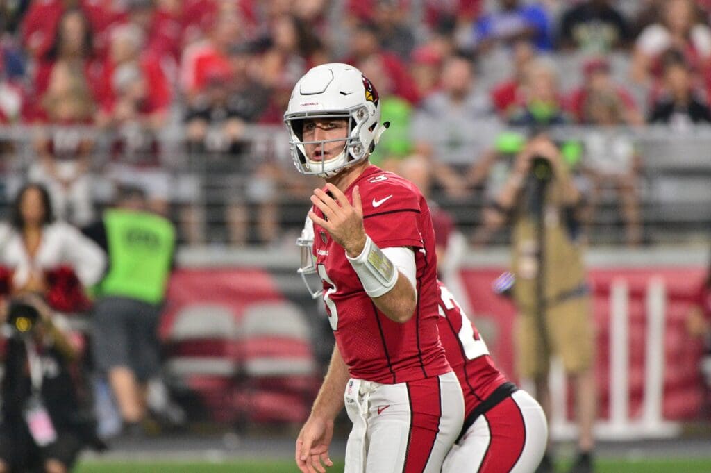 Sep 30, 2018; Glendale, AZ, USA; Arizona Cardinals quarterback Josh Rosen (3) signals to teammates during the first half against the Seattle Seahawks at State Farm Stadium.