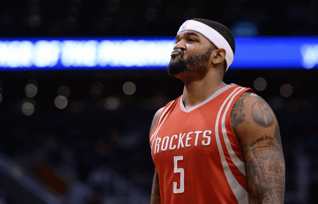 Feb 4, 2016; Phoenix, AZ, USA; Houston Rockets center Josh Smith (5) reacts on the court during the game against the Phoenix Suns at Talking Stick Resort Arena.