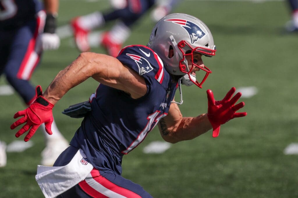 Oct 18, 2020; Foxborough, Massachusetts, USA; New England Patriots receiver Julian Edelman (11) warms up prior to the game against the Denver Broncos at Gillette Stadium.