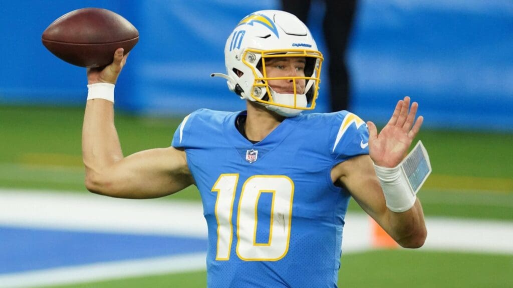 Dec 6, 2020; Inglewood, California, USA; Los Angeles Chargers quarterback Justin Herbert (10) throws the ball in the fourth quarter against the New England Patriotsat SoFi Stadium. The Patriots defeated the Chargers 45-0.