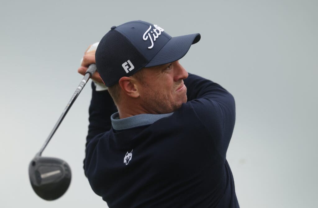 Jul 17, 2025; Portrush, IRL; Justin Thomas hits a shot on the 12th hole during the first round of The 153rd Open Championship golf tournament at Royal Portrush.