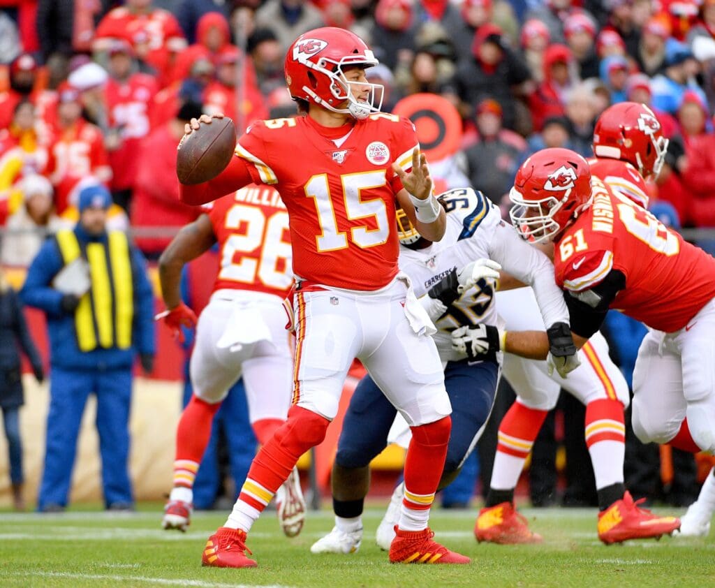 Dec 29, 2019; Kansas City, Missouri, USA; Kansas City Chiefs quarterback Patrick Mahomes (15) throws a pass during the game against the Los Angeles Chargers at Arrowhead Stadium.