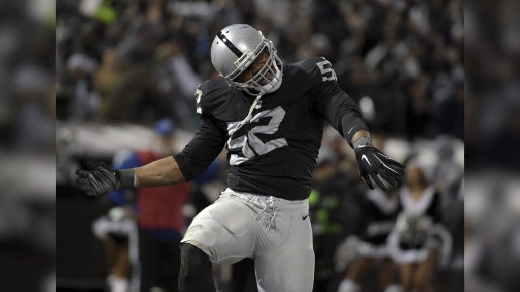 Dec 24, 2015; Oakland, CA, USA; Oakland Raiders defensive end Khalil Mack (52) celebrates after a safety against the San Diego Chargers during an NFL football game at O.co Coliseum. The Raiders defeated the Chargers 23-20 in overtime.
