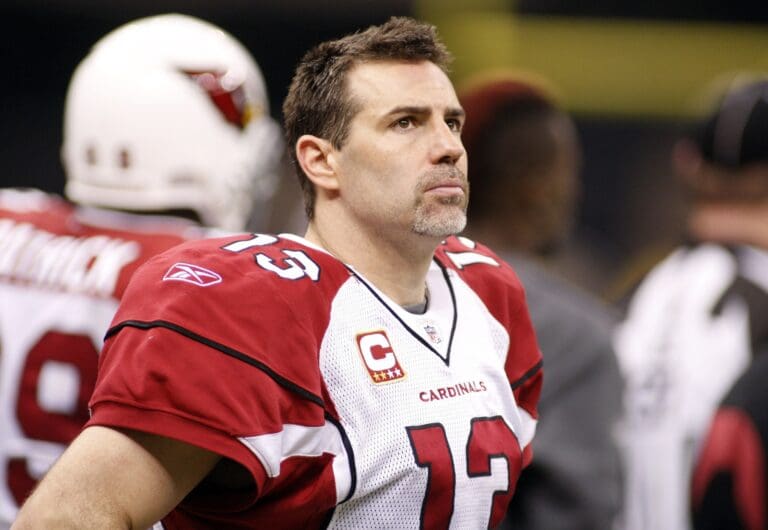 Jan. 16, 2010; New Orleans, LA, USA; Arizona Cardinals quarterback Kurt Warner (13) watches from the sidelines during 4th quarter at the Louisiana Superdome. The Saints defeated the Cardinals 45-14.