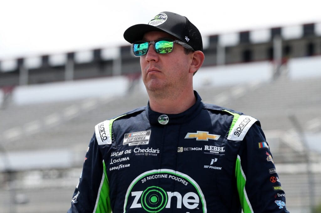 Jun 21, 2025; Long Pond, Pennsylvania, USA; NASCAR Cup Series driver Kyle Busch looks on from pit road during practice and qualifying for The Great American Getaway 400 at Pocono Raceway