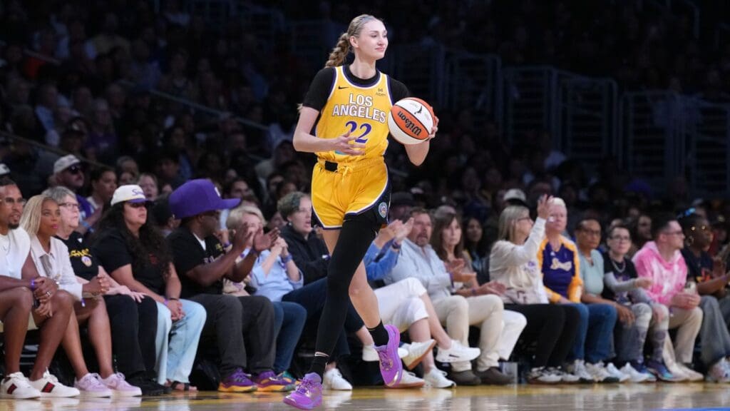 Jul 29, 2025; Los Angeles, California, USA; LA Sparks forward Cameron Brink (22) dribbles the ball against the Las Vegas Aces in the first half at Crypto.com Arena.