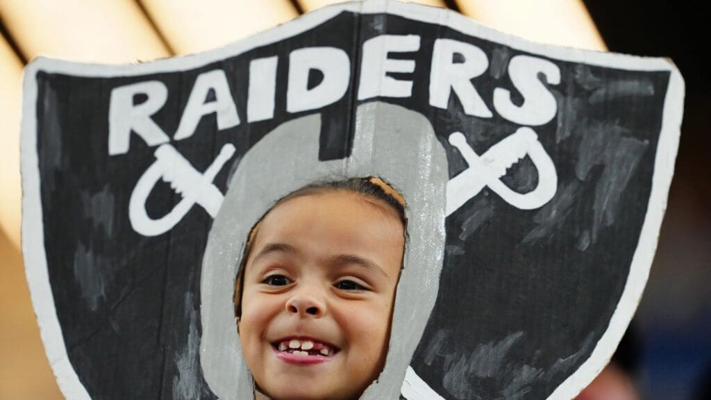 Jan 5, 2025; Paradise, Nevada, USA; A Las Vegas Raiders fan reacts after a play between the Raiders and the Los Angeles Chargers during the second quarter at Allegiant Stadium.