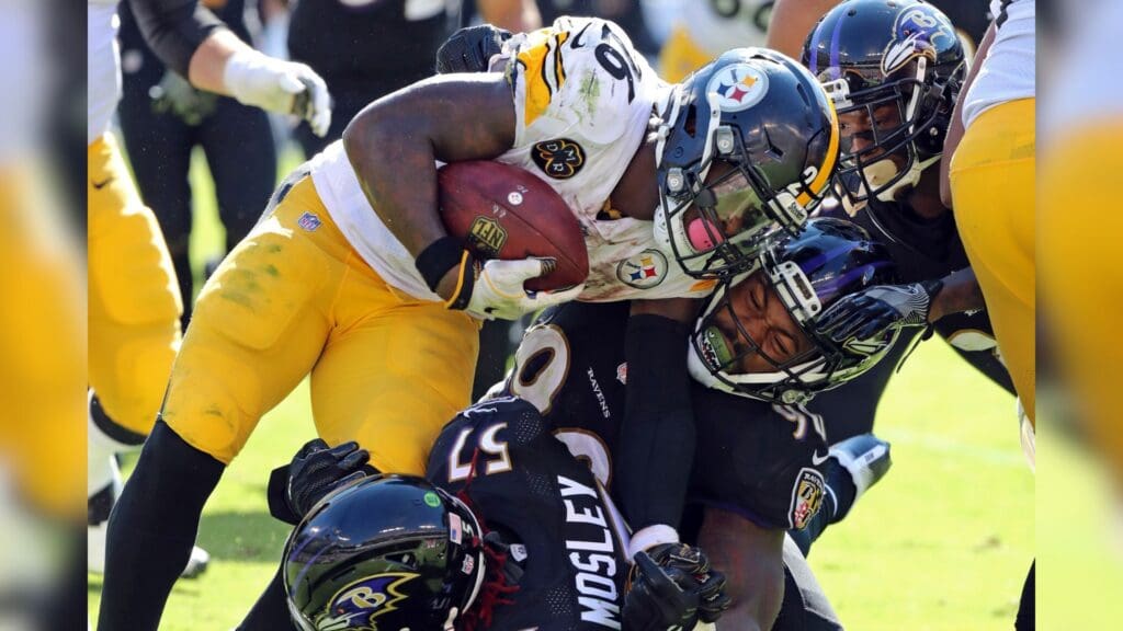 Oct 1, 2017; Baltimore, MD, USA; Pittsburgh Steelers running back LeVeon Bell (26) tackled by Baltimore Ravens linebacker ZaDarius Smith (90) at M&T Bank Stadium.