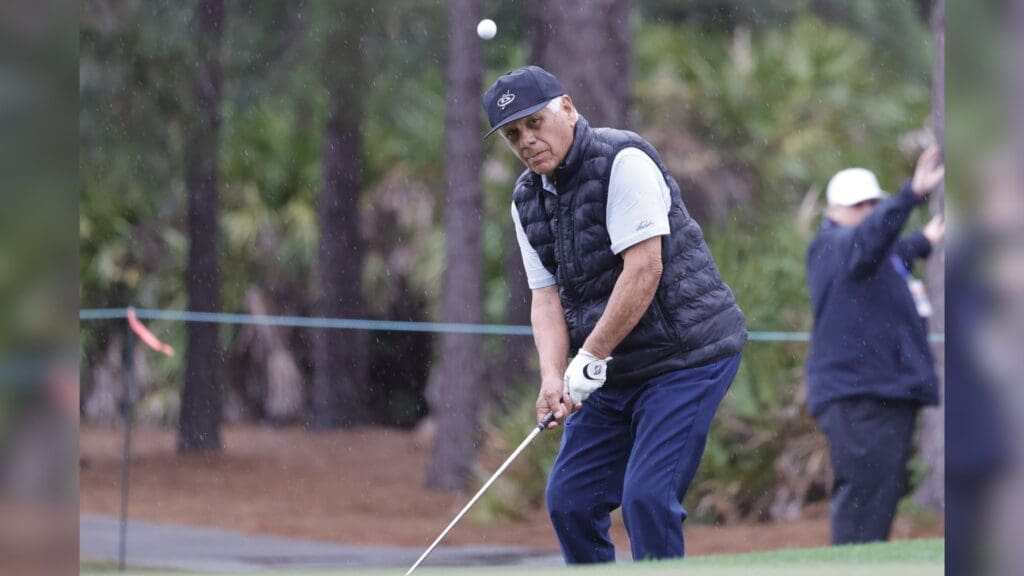 Dec 16, 2023; Orlando, Florida, USA; Lee Trevino chips onto the third green during the PNC Championship at The Ritz-Carlton Golf Club.