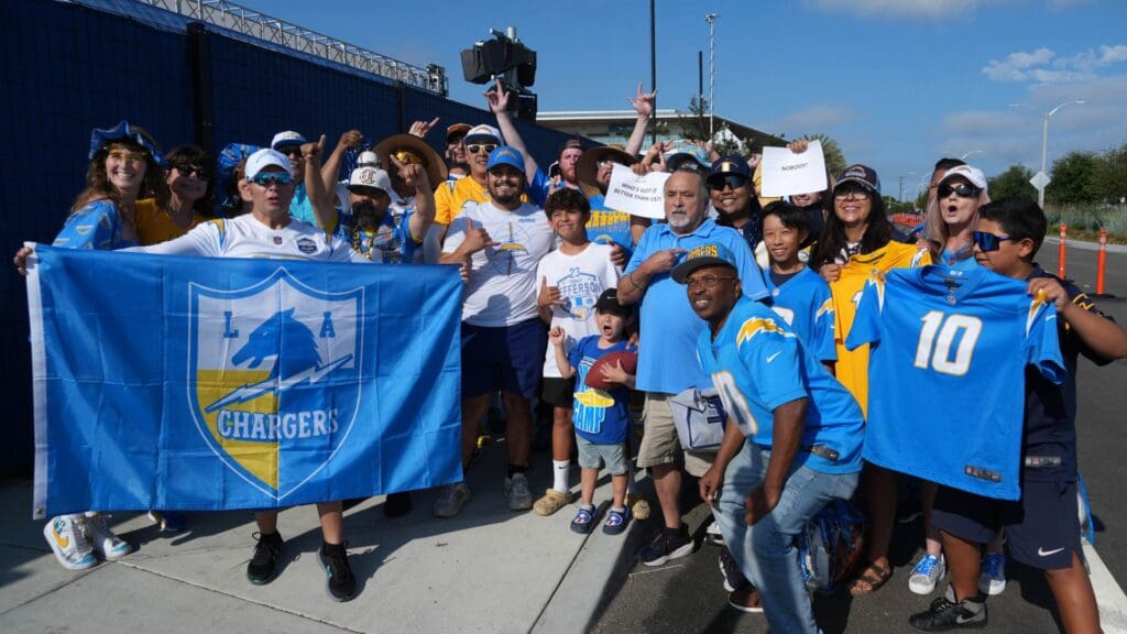 Jul 17, 2025; El Segundo, CA, USA; Los Angeles Chargers fans pose during training camp at The Bolt.