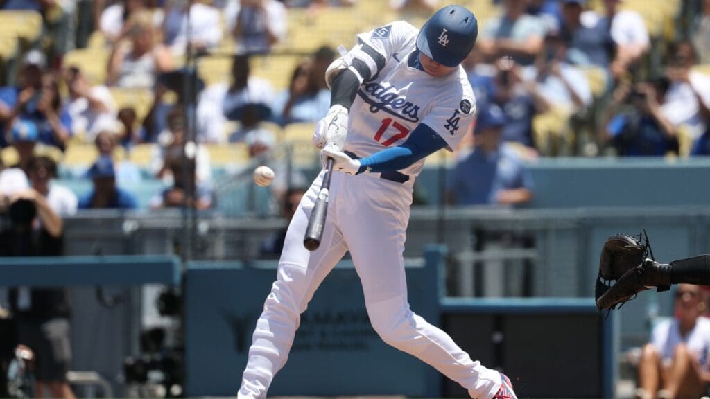 Jul 23, 2025; Los Angeles, California, USA; Los Angeles Dodgers designated hitter Shohei Ohtani (17) hits a home run during the first inning against the Minnesota Twins at Dodger Stadium.
