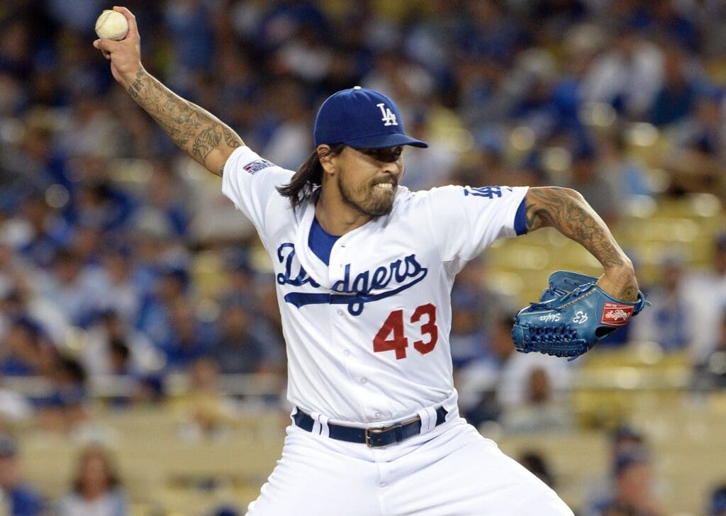 October 3, 2014; Los Angeles, CA, USA; Los Angeles Dodgers relief pitcher Brandon League (43) pitches the ninth inning against the St. Louis Cardinals in game one of the 2014 NLDS playoff baseball game at Dodger Stadium.