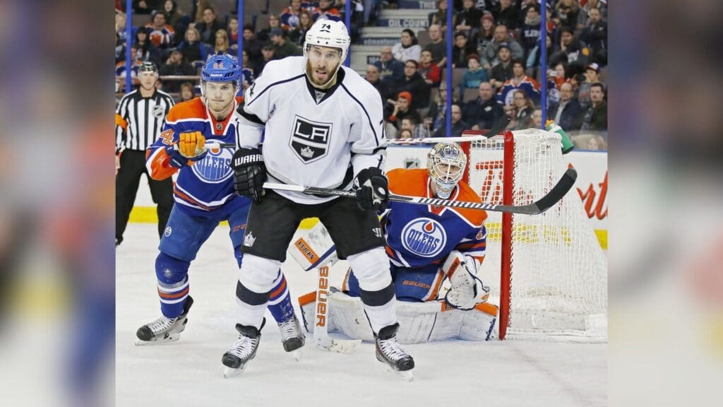 Dec 30, 2014; Edmonton, Alberta, CAN; Los Angeles Kings forward Dwight King (74) looks for a rebound in front of Edmonton Oilers goaltender Ben Scrivens (30) during the third period at Rexall Place.
