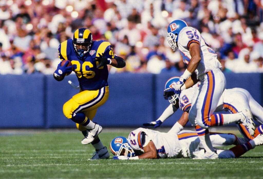 Nov 6, 1994; Anaheim, CA, USA; FILE PHOTO; Los Angeles Rams running back Jerome Bettis (36) carries the ball against the Denver Broncos at Anaheim Stadium.