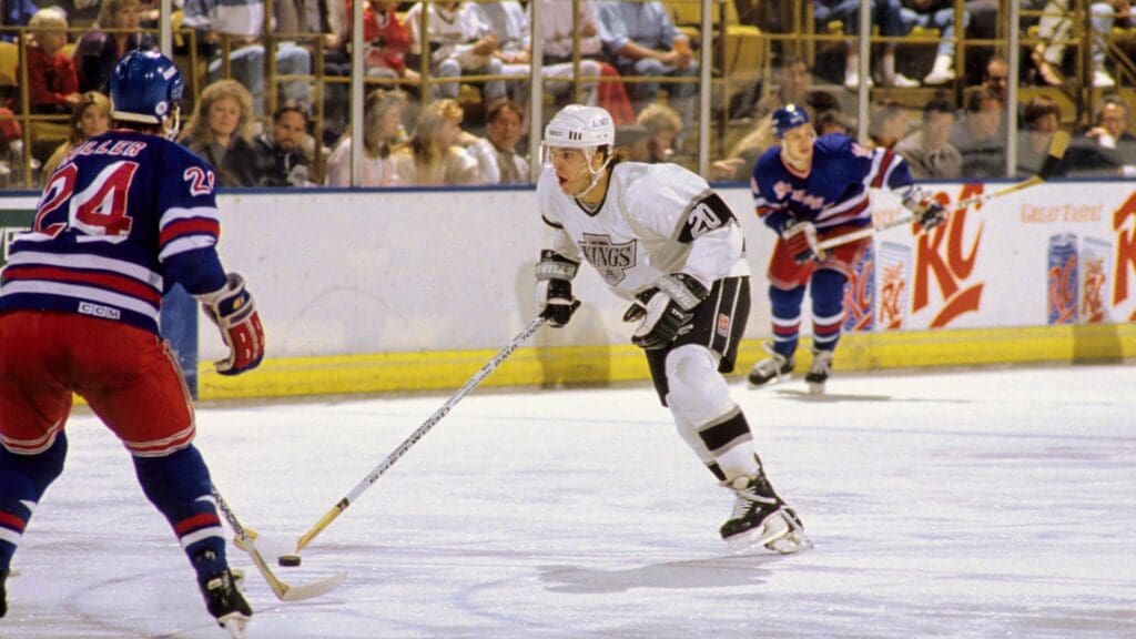 Dec 2, 1989; Los Angeles, CA; USA; FILE PHOTO; Los Angeles Kings forward Luc Robitaille (20) in action against the New York Rangers at The Forum.