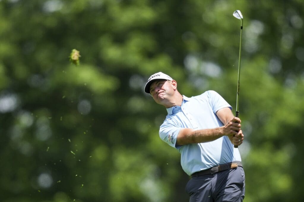 May 29, 2025; Dublin, Ohio, USA; Lucas Glover plays his shot from the fairway on the ninth hole during the first round of the Memorial Tournament presented by Workday golf tournament.