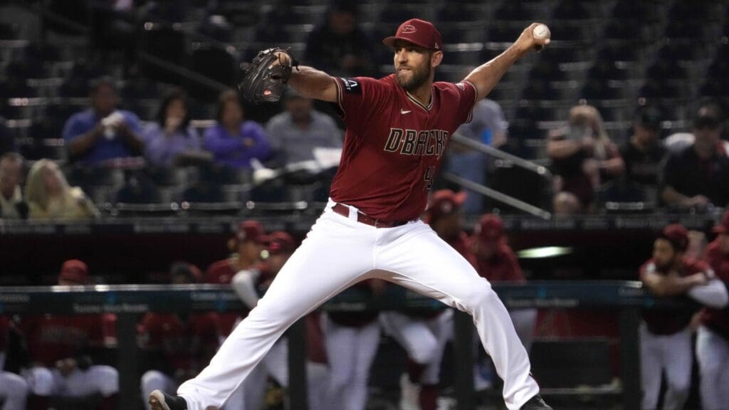 Mar 27, 2023; Phoenix, Arizona, USA; Arizona Diamondbacks starting pitcher Madison Bumgarner (40) pitches against the Cleveland Guardians during the second inning at Chase Field.