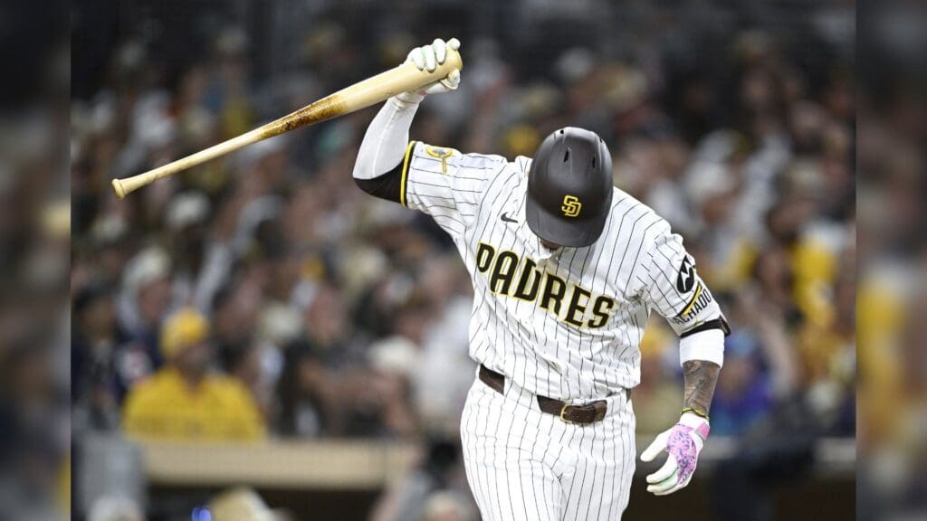 Jul 9, 2025; San Diego, California, USA; San Diego Padres third baseman Manny Machado (13) tosses his bat after hitting a fly ball during the sixth inning against the Arizona Diamondbacks at Petco Park.
