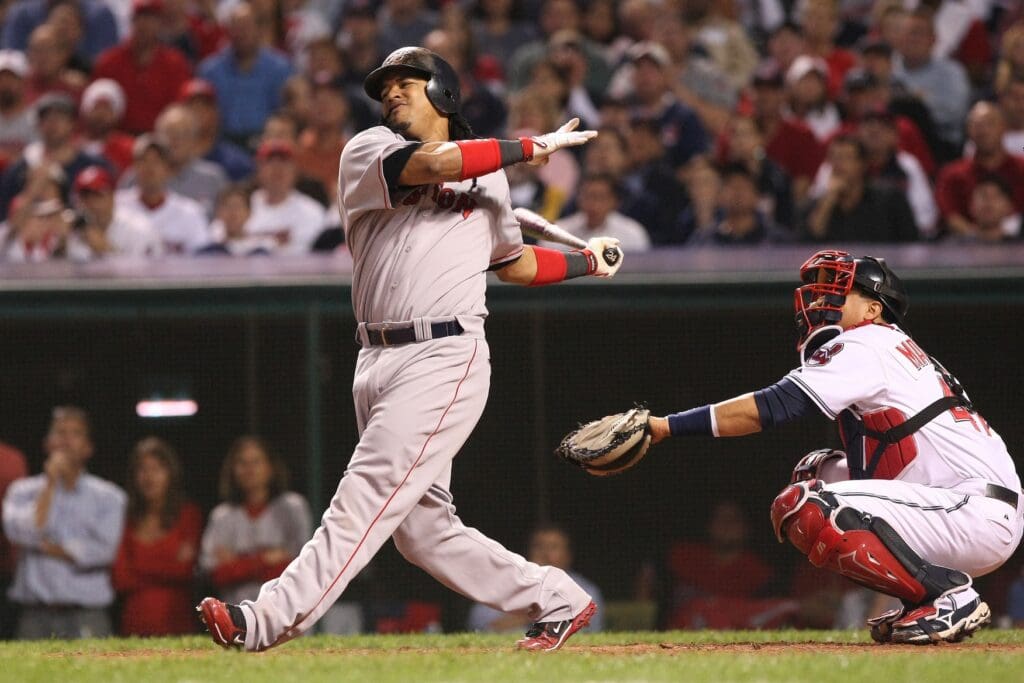 Oct 18, 2007; Cleveland, OH, USA; Boston Red Sox left fielder (24) Manny Ramirez swings and misses at a pitch against the Cleveland Indians during game 5 of the 2007 American League Championship Series at Jacobs Field.