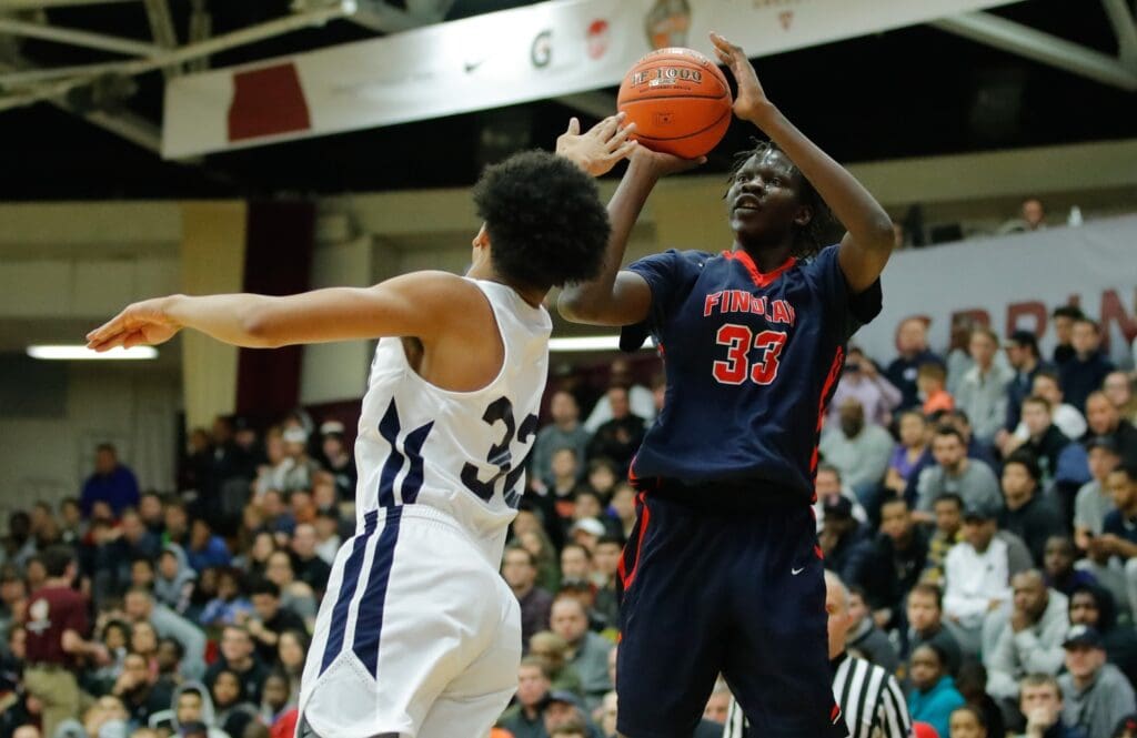 Jan 14, 2018; Springfield, MA, USA; Findlay College Prep guard Bol Manute Bol (33) shoots against Immaculate Conception guard Nick Jourdain (32) during game six on Sunday as some of the top high school basketball teams in the country compete at the Hoophall Classic.
