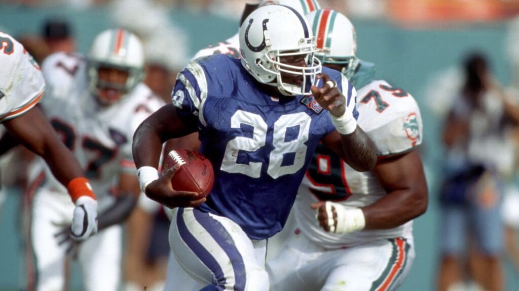 Nov 6, 1994; Miami, FL, USA; FILE PHOTO; Indianapolis Colts runningback (28) Marshall Faulk in action against the Miami Dolphins at Joe Robbie Stadium