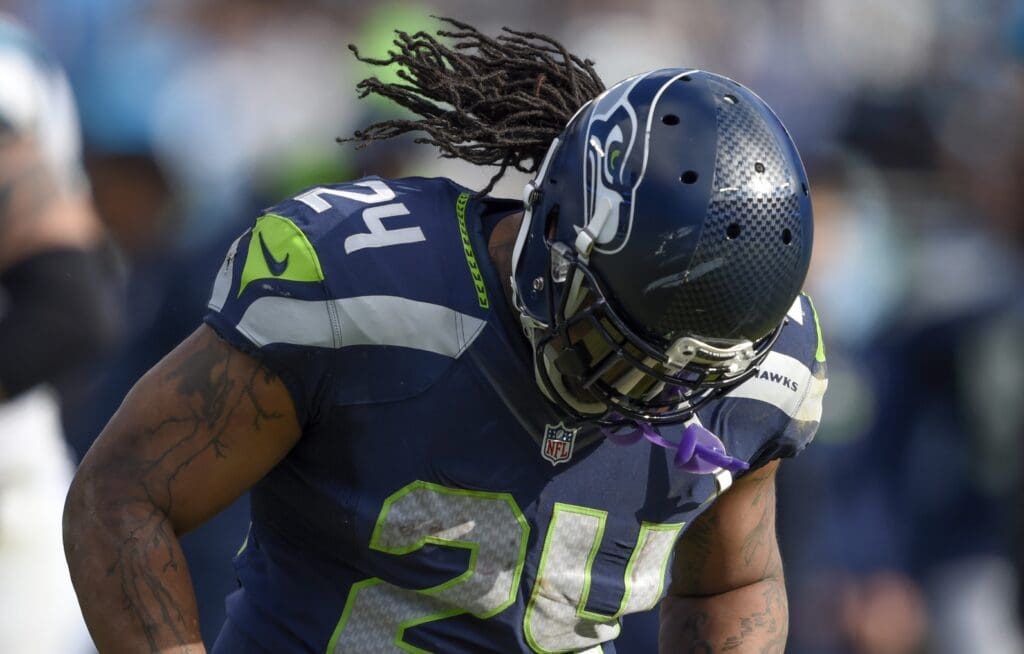 Jan 17, 2016; Charlotte, NC, USA; Seattle Seahawks running back Marshawn Lynch (24) reacts during the second quarter against the Carolina Panthers in a NFC Divisional round playoff game at Bank of America Stadium.