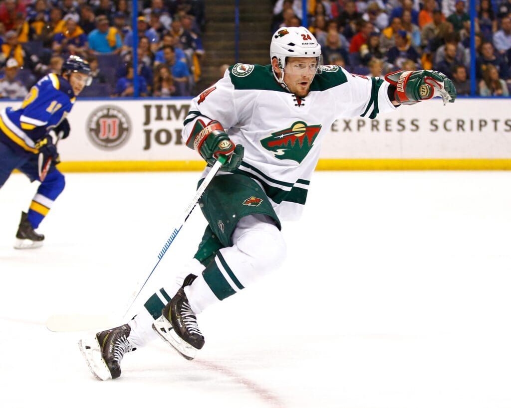 Apr 11, 2015; St. Louis, MO, USA; Minnesota Wild left wing Matt Cooke (24) in action during the second period against the St. Louis Blues at Scottrade Center. The Blues won the game 4-2