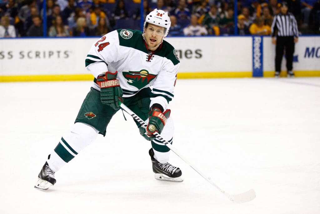 Apr 11, 2015; St. Louis, MO, USA; Minnesota Wild left wing Matt Cooke (24) in action during the second period against the St. Louis Blues at Scottrade Center. The Blues won the game 4-2.