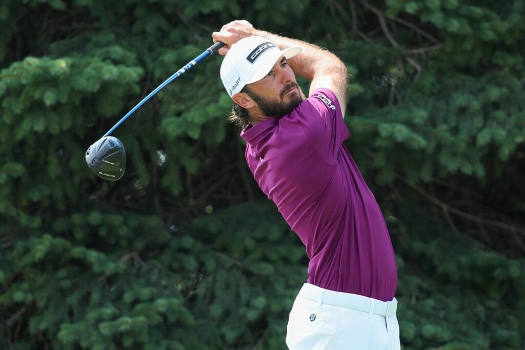 Jul 25, 2025; Blaine, Minnesota, USA; Max Homa plays his shot from the second tee during the second round of the 3M Open golf tournament.