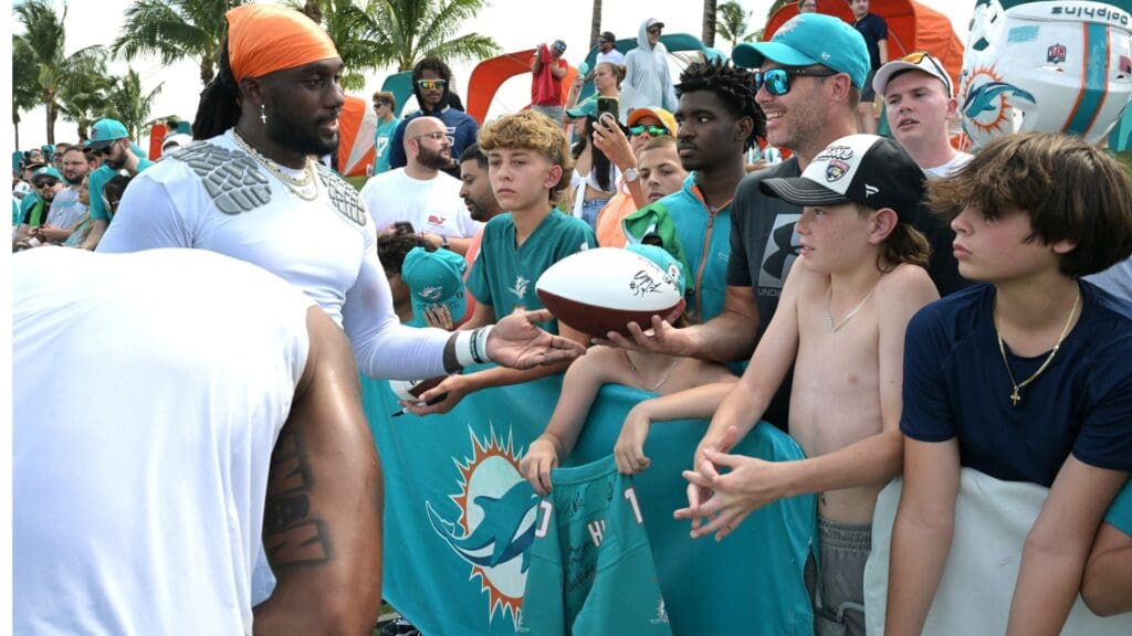 Miami Dolphins fans flock to the team's training field to watch Day 4 of training camp, cheering as players signed autographs and took photos on July 26, 2025.