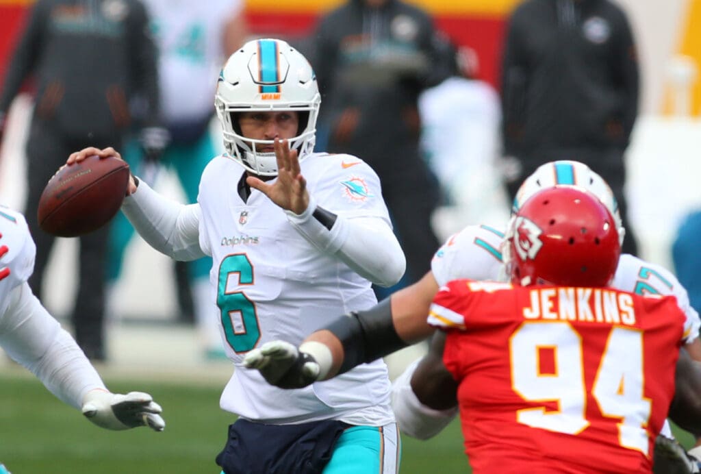 Dec 24, 2017; Kansas City, MO, USA; Miami Dolphins quarterback Jay Cutler (6) throws a pass as Kansas City Chiefs defensive tackle Jarvis Jenkins (94) defends in the first half at Arrowhead Stadium.